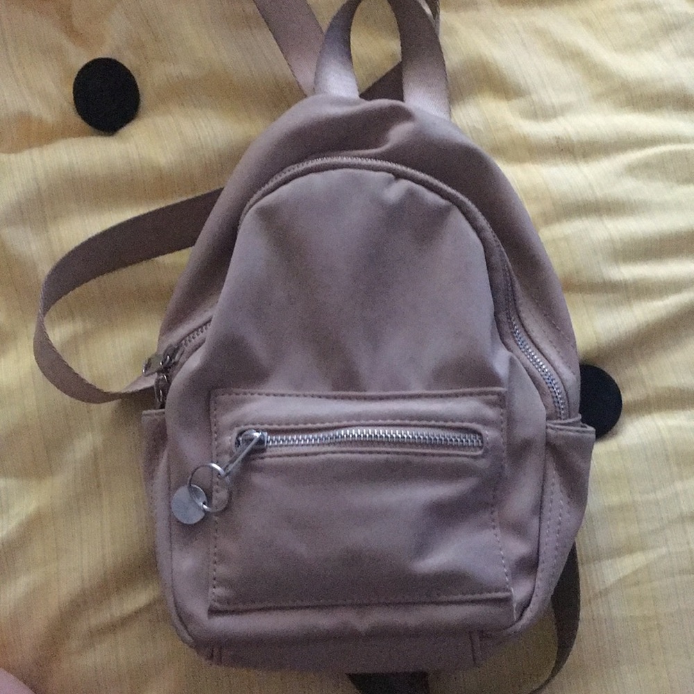 small light brown backpack
